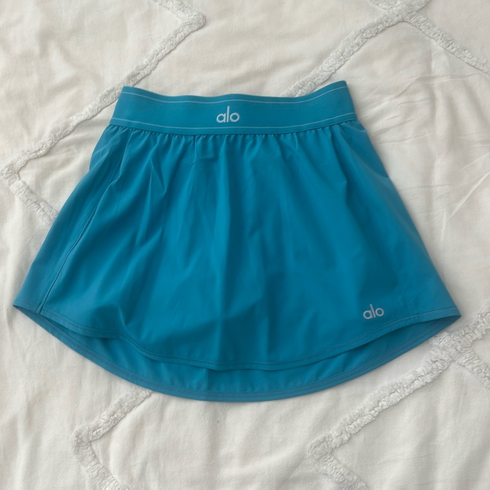 alo tennis skirt, size xs great condition color splash, which is a  vibrant blue